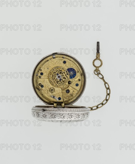 Pocket watch with key by Eardley Norton born 1728, died 1792; fl. 1770–1792. Two silver cases: smooth outer case and inner case with framed glazed lid; mechanism cover engraved with an openwork floral/acanthus twig, with a winding hole and bell. Repeater mechanism. White enameled dial with black Roman hour numerals, minute scale marked with dashes, calendar with Arabic numerals, three steel hands hour and minute openwork weave, third straight for day of month, small seconds subdial with Arabic numerals at bottom. Dial signed EARDLEY NORTON / LONDON. Movement: gilded brass with circular plates connected by pillars, spring-powered drive, spindle escapement; lower plate with openwork crown richly decorated with acanthus tendrils and engraved acanthus volutes; cut-out reserve engraved Eardley / Norton London. Preserved winding key on a chain. Case: Germany, 3rd quarter of the 18th century; maker casemaker active in Germany; movement/case work associated with London. Timepiece. Dimensions: ...
