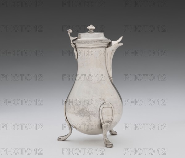 Coffee pot by F. Picard fl. ca. 1798–ca. 1809. Silver vessel, height 46.0 cm, width 8.5 cm, depth 8.5 cm, weight 248.2 g; Paris, France; dates: 1798–1809; classification: coffee pot, tableware, jug., A reflective metal pitcher with a rounded, tapering body stands on a group of curved legs; it has a hinged lid topped with a small finial, a curved spout, and an attached handle with a thumb piece. The surface shows subtle patches of wear and varied sheen, and the visible colors are shades of silver, gray, and off-white, set against a gradient gray background.
