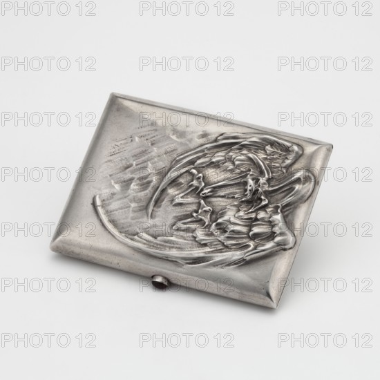Cigarette case, scrap - purchase; Art Nouveau; bats; tobacco accessories. Rectangular cigarette case with rounded corners and a decoration on the lid in the shape of a flying bat. On the reverse, an engraved, tied Cyrillic monogram WAP and a facsimile of donors' signatures and the date 29 June 1913. Early 20th century, Russia. Height 7.5 cm; width 10.1 cm; weight 160 g., A rectangular metallic object with a raised sculptural design on its top surface, showing a textured, flowing form that resembles layered, curved elements and smooth ridges; the object has slightly beveled corners and a small cylindrical protrusion along one long edge. The visible colors are shades of silver and gray with darker gray shadows and subtle highlights.