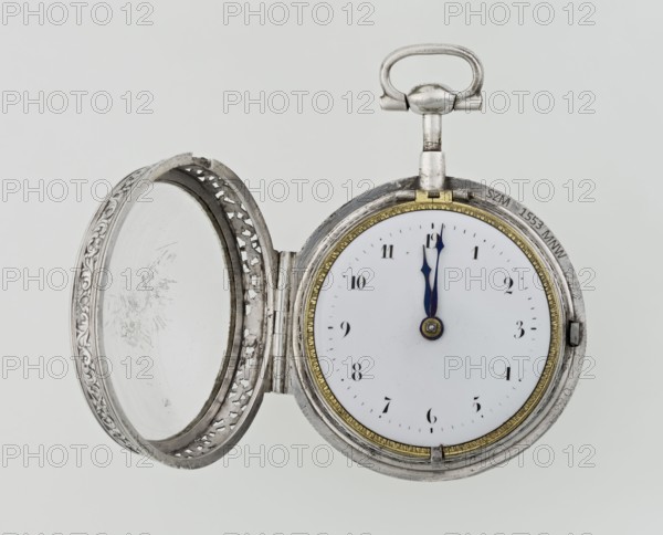Pocket watch, maker: Carl Willougby; repossession provenance; openwork case; acanthus scrolls, fish scale ornament, shells, birds and masks male and female as decorative motifs; openwork mechanism decorations. Pocket watch with striking function, silver in a partially openwork case, richly decorated with engraved ornament covering the entire surface of acanthus twig and flowers, among which birds and two masks; in the centre a circular reserve made of acanthus twig, volutes and fish scales, inside a bell. Glazed lid enclosed by an openwork frame decorated with a floral twig and a broken ribbon. Mechanism between two circular plates supported by columns, with a spindle escapement, a worm with a chain, and a balance drum. Gilded, openwork crown with an engraved acanthus twig, combined with an openwork foot and a woman's mask. White-enameled dial edged with a gilded, knurled ribbon, hour markers in Arabic numerals, minutes marked with vertical lines; steel hands. 2nd quarter of the 18th c...