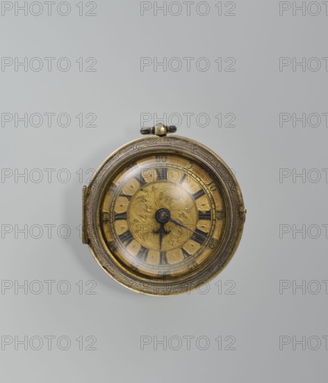 Pocket watch by Jacques Marcet fl. ca. 1725–ca. 1750, 2nd quarter of the 18th century. Gilded silver, almost spherical double case; enameled numerals on the dial. Cases decorated with plant decoration: inner case with flowers in a vase in a reserve formed by a ribbon that on the outer side forms heart-shaped loops with floral sprigs between them. A strip of plant-floral tendrils runs on the side of the case. Outer case has a flower sprig in a circular central reserve surrounded by an interwoven ribbon and floral sprigs in the fields. Movement has an openwork bow and the Jacques/Marcet signature. Engraved case decoration is stylized in a Middle Eastern style—possibly intended for the Turkish market. No firm information about the watchmaker; he may have worked in England possibly a Huguenot. Country: France . Object type: timepiece. Dimensions: height 6.5 cm, width 5.5 cm, depth 4 cm. Inside both cases: number E. 4 unidentified. Style: classicism; decorative vases; flowers., A round meta...