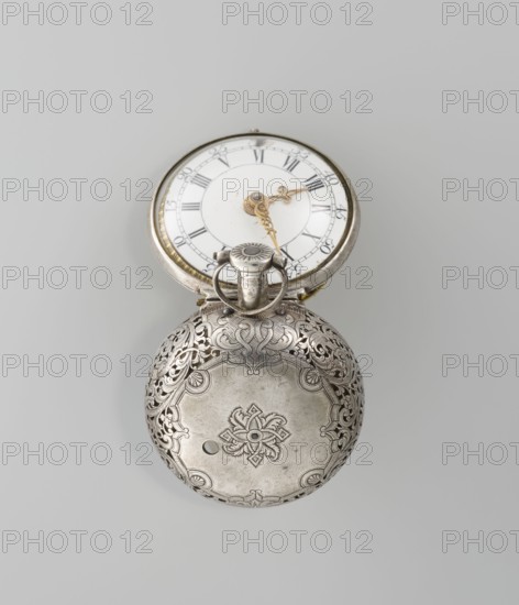 Pocket watch by Shart, signed on the movement Shart / London, c. 1730s, London, England. Double silver case with inner case openwork in Regency motifs; outer case repoussé scene depicting Diana hunting surrounded by an openwork border with male and female busts. White enamel dial with Roman numerals for hours and Arabic minutes, openwork hands. Timepiece; height 6.8 cm, width 4.8 cm., A pocket watch with its lid open showing a round white face with dark markings and ornate gold hands sits above an ornately engraved silver case; the case displays intricate floral and scrollwork patterns with a central decorative motif and a small circular opening, and the overall colors visible are silver, white, gold, and shades of gray.