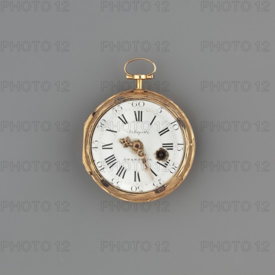 Pocket watch by Daniel Schepcke fl. 1765–1775. Gold case engraved with a bouquet of flowers and a butterfly, the bouquet surrounded by leaves and flowers. White enameled dial with black Roman and Arabic numerals, openwork hands, keyhole between III and IIII, signature on the dial. Dated 1770–1775. Timepiece, height 6.5 cm, width 4.3 cm. Origin: Warsaw, Poland. Subjects/ornament: flowers, bouquets, butterflies., A round pocket watch with a gold-toned metal case showing tarnish and wear sits against a flat gray background; the watch face is white with ornate gold-colored hands and a decorative winding loop at the top, and there are small dark spots and areas of discoloration on both the face and the metal rim, with visible black Roman numeral markers and a ring of smaller black minute markings.