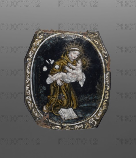 Plaque with a depiction of the Duke of Champagne and the Bishop of Beauvais, Nouailher, Colin fl. ca 1550, Beauvais France, painted enamel, Rectangular, standing, with a depiction of the bishop in a miter, with a crosier, in a blue pluvial, at the feet a coat of arms with a white cross, with four keys between the arms. On the sides in gold LEVESQUESDE and on the other BEAVVAS. On three sides near the edge on a white background there is an inscription: MOY:CONTE.EVESQVE.DE.BEAVVAIS.ME / D..OY . AVSACRE.TRAN..SPRTER / POVR DEMONSTRE.LACOTTE.DARME.PORTER. Originally eight plaques mounted in a wooden box, ca. mid-16th century, France, Limoges, plaque, height 15.9 cm, width 10.8 cm, An oval-shaped painted plaque with a decorative border shows a robed figure holding an infant; the robed figure wears a brown garment and has a halo of radiating lines, and the infant is pale with a surrounding halo and is wrapped in a white cloth. The scene is set against a dark background with hints of blue, a...