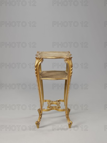 Side table, equipment of representative buildings of the Republic of Poland 1918–1939, unknown origin, plant decoration, acanthus ornament, volutes, neo-rococo style, 3rd quarter of the 19th century, Warsaw, furniture, table; height 77.3 cm, width 50 cm, depth 40 cm, A narrow wooden stand with ornate carved legs and decorative scrollwork, finished in gold and light brown tones, standing against a plain pale gray background.