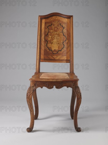 Chair, origin unknown, Rococo, ca. 1750–1765, Germany. Rococo chair with volute ornament, plant decoration, acanthus, shells, female figures, flowers, ribbon-and-pincer ornament. Boarded inlaid backrest a lady in a crinoline surrounded by flowers; rectangular originally upholstered seat; cabriole legs decorated in bas-relief with motifs at the top including shells on the knees, terminating in volute feet. Frame wavy-cut at the bottom, decorated with acanthus leaves. Seat frame with wavy outer outline enclosing a padded central section. High backrest with clearance, angular stiles, and a wavy-curved upper section. Inlaid representation on the backrest framed by two intertwining U-shaped ribbons. Furniture — seating piece. Dimensions: height 115 cm; width 53 cm; depth 63 cm., A wooden chair with a tall rectangular back featuring an inlaid decorative panel showing floral motifs and a central figure, the back framed by a subtly curved top and vertical stiles; the seat has a padded cushion ...