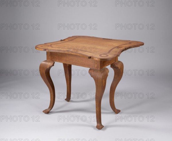 Game table, baroque style; ribbon ornament; games; purchase provenance noted; GAME TABLE with a rectangular frame and an extendable tabletop—when unfolded, close to a rectangle with rounded corners and concave sides—supported by four cabriole, smooth legs. The legs are strongly curved and widened at the knees, with a ridge defining symmetry and widened feet so-called vipers. The frame extends, supporting the foldable top plate; wide, flat frame. The tabletop is inlaid on both sides with a ribbon ornament that frames the edges and divides the central field, with loops in the rounded corners, and with the date 1.7.4.8 in black on the outside. On the upper surface of the unfolded tabletop, in the center of each side, are recesses for tokens and stones. Steel scissor hinges. Possibly 1748. Northern Germany origin. Piece of furniture; table. Height 73 cm, width 90 cm, depth 87.3 cm., A wooden table with a warm brown finish and a shaped rectangular top featuring darker inlaid curved decorati...