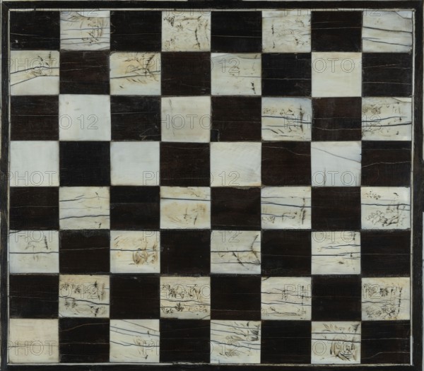 Chess, mill and backgammon box, games, flower vases, chess, plant decoration, baroque style, landscapes, backgammon, animals, birds, checkers, 1680s, France, furniture, game furniture, height 9 cm, width 37 cm, depth 32.8 cm, The image shows a square board with a checkerboard pattern made of alternating dark brown and off-white squares; the off-white squares display fine dark lines and faint etched drawings, while the dark brown squares appear uniformly solid and slightly textured; a thin dark border frames the board and the overall color palette includes dark brown, off-white, cream, and small accents of black from the etched lines.