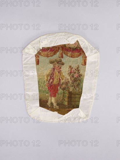 Three tapestry armchair covers, assorted designs: flowers, floral ornaments, genre scenes, interior furnishings, garlands; decorative upholstery tapestries. Scenes: a boy sitting on a hillock playing a flute, b boy watering flowers, c girl sitting on a hillock. 2nd half of the 18th century, Aubusson. Fabrics; height 27.5 cm, width 35 cm., A decorative textile framed by a white fabric border lies flat against a light gray background, showing a woven scene with a figure wearing garments in red and yellow tones and a hat in brownish hues standing beside a planter filled with flowers in shades of pink and green; above them is a draped curtain in red and gold, and the scene includes background greens and muted blues with areas of worn texture and scattered loose threads.