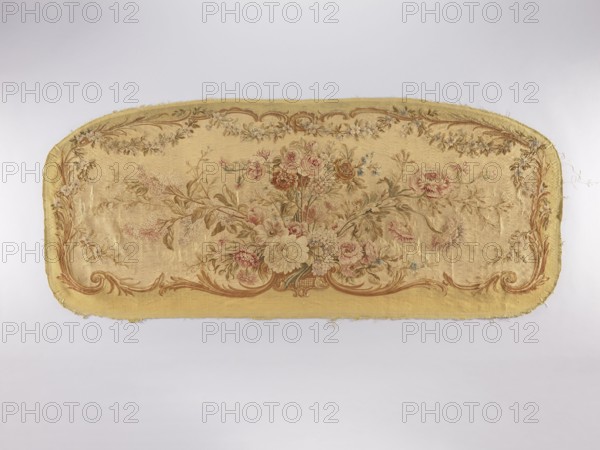 Two tapestry armchair backrest upholsteries and one sofa upholstery, varietal, flowers, floral ornaments, furniture upholstery, interior furnishings, decorative fabrics, tapestries; a, b armchair upholstery with a bouquet of flowers in the center, surrounded by a frame of acanthus flowers and leaves; c sofa upholstery with a spreading bouquet of flowers surrounded by a frame with acanthus flower and leaf motifs. Colors: sandy background, olive, pink, red, ochre, blue, and green ornaments. 18th/19th century, France; fabrics; height 64 cm, width 62 cm., A long, oval-edged woven textile panel with a pale yellow background featuring a central floral bouquet and surrounding floral garlands; the bouquet includes roses and other blossoms in shades of pink, peach, cream, and muted red with green and olive leaves, and small blue accent flowers, set within scrolling acanthus-like ornament in warm brown and tan tones; the border and inner decorative swags show similar brown, tan, and cream shadin...
