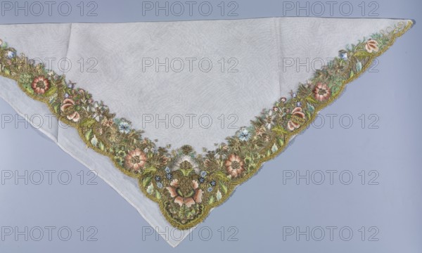 Shawl, shawl; fashion accessory; embroidery; repossession provenance; 18th century, 1st half of the 18th century; Germany; flowers and plant patterns; women's clothing; fabric; length 80 cm, width 80 cm, A triangular pale fabric with a scalloped embroidered border showing a floral design in green, gold, pink, blue, brown, and white, laid against a light bluish-gray background; the central area of the fabric is plain and translucent white, while the embroidered edge features a dense arrangement of stylized flowers, leaves, and textured metallic threads in muted green and gold tones accented by soft pink and blue blossoms and small white highlights.