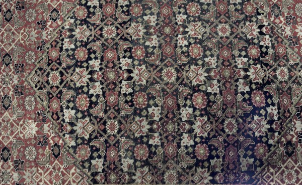 Carpet, Knotted woolen fabric, woven carpet, 2nd half of the 19th century, Iran. In the center are four nested hexagonal medallions. Their interiors and the remaining small background area are filled with motifs of flowers, lanceolate leaves, and rosettes surrounding rhombuses. Three-band border with floral motifs. Colors: multiple reds, cream background, blue ornament. Height 667 cm, width 415 cm., A patterned textile filling the frame with a dense arrangement of geometric and floral motifs in a muted palette, showing shades of red, dark blue, beige, cream, and touches of olive green and black, with repeating medallion shapes and ornate border fragments creating an overall symmetrical, intricate design and a slightly worn, textured appearance.