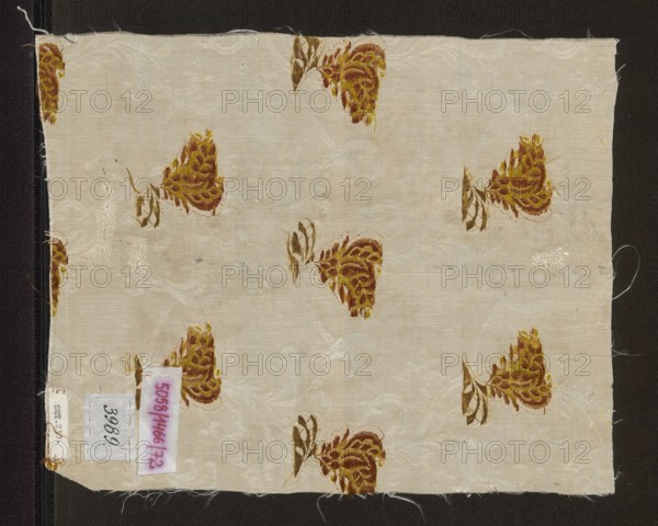 Fragment of fabric, varia, purchase provenance removed specifics. Fragments of silk fabric, patterned, 18th-century silk, floral patterns, fabric with preserved repeat. Weave: background in a grosgrain weave with texture enriched by released weft threads creating a complementary ornament liseré; brocaded with colored threads. Pattern: projections of small stylized flower sprigs with large, fantastic blooms; flowers arranged in horizontal and vertical rows, changing direction with each row. Colors: white background ornament; white, lemon, orange, celadon, olive. Repeat: 9.5 x 16.5 cm. Date: 1740–1760. Place of origin: France. Object type: fabric. Height 29 cm; width 22.5 cm., A rectangular piece of fabric with a pale beige background featuring a repeating motif of stylized floral shapes in shades of yellow, gold, brown, and a muted red, each floral accompanied by small leaf-like elements in brown and olive tones; subtle woven or embossed swirls and texture in a slightly lighter beige ar...