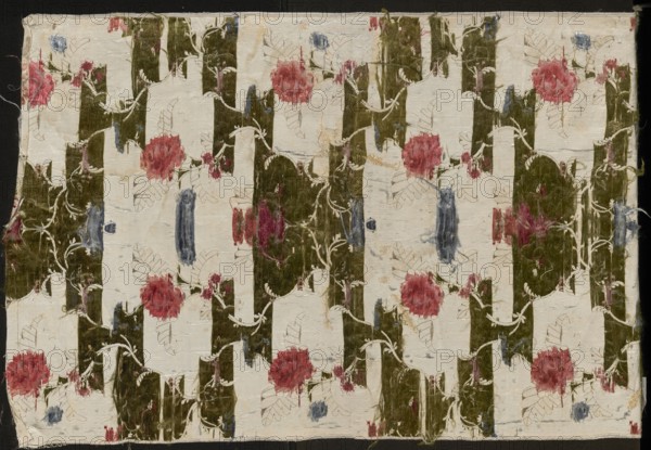 Fragment of a fabric in the form of a tapestry or napkin;, Fragment of 18th-century French silk fabric Gros de Tours with white grosgrain background enriched with a small ornament liseré brocaded with colorful threads. Pattern brocaded in gold, pale pink to red, grass green, blue–sky blue, dark blue, burgundy-pink. Preserved selvedge, fabric width, and fabric pattern. Dimensions: 32.5 x 53 cm report; overall height 86 cm, width 54.5 cm; border widths 0.4 + 0.3 cm., A patterned textile with a cream background featuring a repeating design of olive green vertical blocks, pinkish red floral shapes, and bluish gray brushlike marks, all connected by thin cream-colored vine lines and leaf outlines, with visible fabric texture and frayed edges.