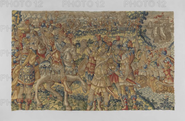 Figural tapestry by Franz Geubels 1535–1590, 2nd half of the 16th century, Brussels. Tapestry depicting a battle scene: in the foreground center a victorious general Caesar on horseback; a soldier in front holds the severed head of Pompey, with two soldiers at the sides. Foreground right shows a leader on horseback with a soldier holding a severed head and other soldiers nearby. Background right is a seascape with ships filled with troops; background middle and left show tents, troops on horseback, and a bonfire lit on the seashore. High horizon with an outline of mountains. Materials: woven decorative fabric; colors limited and saturated—green, red, sapphire, sand, and yellow. Dimensions: height 212 cm, width 347 cm. Border clipped / no border., A richly detailed woven scene fills the image, dominated by warm golds and tans with accents of blue, red, green, and beige. Several figures in ornate armor and plumed helmets stand and ride horses across a landscape of stylized foliage and ro...