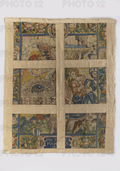 Figurative tapestry, unknown workshop/creator; draughtsman Maerten de Vos 1532–1602 co-creator. Tapestry depicting religious imagery: In the foreground left St. John writing in a book, above him an angel pointing at the city. On the right, the Heavenly Jerusalem; outside the walls Christ as the Good Shepherd with sheep; above the city God emerging from the clouds and the Holy Spirit as a dove. Border with bunches of flowers and fruit and medallions: side medallions personifications of virtues; top cartouche with the Debno and Labedz coats of arms; bottom medallion inscription: ETVITAM/AETERNAM/AMEN. Colors: sand, navy blue, green, red, and pink. Early 17th century dating narrowed by Jerzy Samson Podbereski’s marriage before 1602 and death 1629/1630. Poland, Material: fabric. Height 284 cm, width 232 cm., A rectangular textile with a pale beige fabric border and a cross-like beige strip pattern over a colorful woven panel, showing a series of painted or embroidered scenes divided into s...