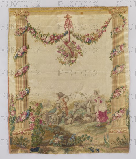Figural tapestry: Pastoral scene with a shepherd, a shepherdess, and a boy. In the center, a man with a knot on a stick, accompanied by a boy and a woman with a switch, head right toward a distant village. In the foreground a goat and a flock of sheep, a donkey emerging from behind the woman. Scene flanked by tall columns decorated with garlands of interwoven flowers; above, between the columns, a garland supports the architrave. Smaller flower garlands hang from a pendant entwining a shepherd's hat, staff, and wineskin. Colors: light cream background, multi-colored flower garlands predominating in pink and green whitish tones. Fabrics with similar pastoral love scenes were popular from the late 1770s and were modeled on drawings by Jean-Baptiste Marie Huet 1745–1811. Dated ca. 1750–1780, France. Materials: textiles tapestry/weaving. Dimensions: height 220 cm, width 180 cm., A rectangular woven textile with a pale cream background framed by two tall fluted columns on the left and right...