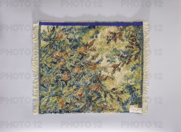 Tapestry chair cover, Repossession provenance. Decoration: flowers, leaves, trees, landscapes, interior decorations, interior furnishings, fabrics, tapestries, furniture upholstery, fruit and flower motifs. Colors: cream background with green, yellow-orange, brown, and yellow ornamentation. Date: 1st half of the 20th century. Place of origin: Vienna. Material: fabrics. Dimensions: height 76 cm, width 67 cm., A rectangular woven textile with fringed edges lies flat against a pale gray background, showing a textured surface of tangled yarns and loops in a mottled pattern; the textile displays a mix of colors including blue, green, yellow, cream, brown, and hints of rust, with a narrow band of solid dark purple along one long edge, and cream-colored fringe along the short sides.