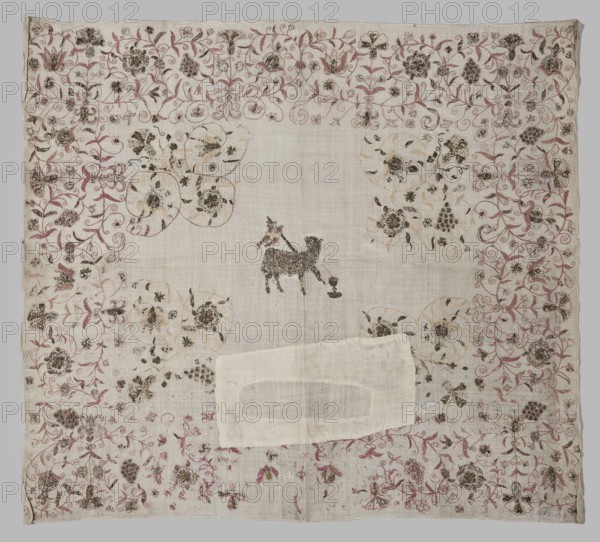 Velum, revindication provenance, church paraments, Eucharistic Lamb iconography, churches and chapels furnishings, Henryków German: Heinrichau, Church of St. Mary Magdalene Wroclaw ? — Velum or church cloth of white linen, embroidered with silk and gold thread. In the centre is a Lamb with a labarum and a chalice, into which blood spurts from its breast. Around the edges is an elaborate plant twig with motifs of grapes and flowers. In the central field, floral motifs are featured in the corners. Embroidery with pierced silk and metal thread, with cord and satin stitches. Some of the metal thread embroidery elements are made on a colored silk backing. The metal thread is a silver plate woven onto a silk or linen base. E. Soszko, 16th century, Silesia, liturgical vestment, height 63 cm, width 70 cm, A square piece of light-colored fabric with an embroidered border of floral and vine motifs in shades of pink, brown, and gold surrounding a plainer central area; the border features a dense ...