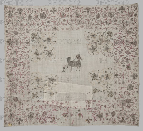 Velum, Velum or church cloth of white linen, embroidered with silk and gold thread. In the centre is a Lamb with a labarum and a chalice, into which blood spurts from its breast. Around the edges is an elaborate plant twig with motifs of grapes and flowers. In the central field, floral motifs are featured in the corners. Embroidery with pierced silk and metal thread, with cord and satin stitches. Some metal thread embroidery elements are made on a colored silk backing. The metal thread is a silver plate woven onto a silk or linen base. Revindication, 16th century, Silesia. Liturgical vestment. Height 63 cm, width 70 cm., A square cloth with a pale off-white background decorated with an embroidered border of winding floral and vine motifs in shades of muted pink and dusty rose, with additional embroidery in beige, gold, and dark gray. The center area is mostly plain with visible weave texture and a small embroidered animal figure in dark gray near the middle, carrying a tiny object. Gro...