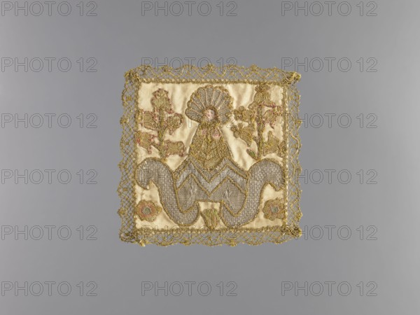 Pall, Embroidery, church paraments; plant ornaments, sacred art; churches and chapels furnishings. Pall of white satin, embroidered with thread with silver metal braiding and silk yarn. In the center is the figure of Mary or the Child on a stylized floral chalice. On the sides of the figure are two sprigs of lilies, and at the bottom edge are three flower heads. Pall trimmed with gold bobbin lace. Pink silk lining. Embroidery on a satin base applied to a silk satin fabric. Pierced and flat laid stitches made with metal threads, held in place with colored silk. The flower on which the figure stands is made of metal-braided threads arranged vertically and horizontally and interwoven in a weaving manner. The split and string stitches are made of silk yarn. The figure's hair is made of laid silk thread, tied in dense knots embroidery technique description. The figure's face is painted on parchment. 17th century, Poland; liturgical vestment. Height 15 cm, width 15 cm., A square textile pane...