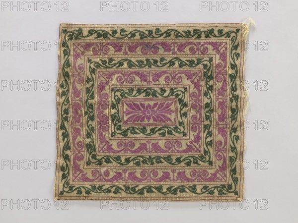 Velum, church paraments, vellum, plant ornaments, unknown origin, 19th century, Poland, liturgical parament, height 44 cm, width 42 cm, A square textile with a central rectangular floral motif surrounded by a series of nested decorative borders, all on a light beige background; the design features a few shades of purple and a dark green used for stylized leaves and scrollwork, with thin gold or yellowish threads outlining many elements; the fabric shows slight wrinkles and a few loose threads along one edge, and the overall piece lies flat against a pale neutral surface.