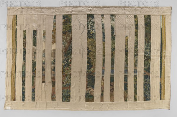 Tapestry — verdure; unidentified maker;, noted; flowers, floral ornaments, roosters, birds, fountains, trees; borders, tapestries, interior furnishings, garden scenes, decorative fabrics, animalistic scenes, landscape scenes, interior decorations, garden sculptures, park sculptures, park architecture. In the foreground, two fighting roosters. On the right, a fountain in the form of a round bowl supported by dolphins and surrounded by two statues. On the left, a water pool surrounded by arcaded niches with statues, and on its axis, a water cascade. In the background, on the right and left, palace buildings. Surrounding trees and flowers. Border with rosette and rhombus motifs. Colors: green, blue, ochre, gold, red, and sand beige. 18th century, Flanders. Fabrics; height 290 cm, width 465 cm., A rectangular textile with a border of light beige fabric surrounds a central area composed of alternating vertical strips; several of the strips are light beige and several reveal a patterned unde...
