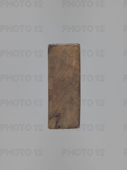 Double-sided gingerbread mould. Side A: bison; Side B: three figures — a bachelor in early 19th-century costume with hat, justokor, knee-breeches and high boots; a baby in swaddling clothes adorned with a plant twig; and a fish with an elongated, scaled body. Rectangular wooden mould, edge engraved with the date 1806 and, in the middle of the date, the letter S against an anchor manufacturer/gingerbread maker mark. Materials/genre: gingerbread mould, decorative/folk art; motifs: figurative scenes, human figures, zoomorphic motifs, Striding Bull iconography, historical costume. Date: 1806. Place: Province of Silesia 1742–1918. Dimensions: height 19.5 cm, width 10.5 cm, depth 4.3 cm. Maker unknown woodcarver or gingerbread maker., A rectangular vertical block with rounded corners and worn surfaces, showing a brown and tan wooden grain with darker brown streaks and a few thin cracks, set against a smooth light gray background.