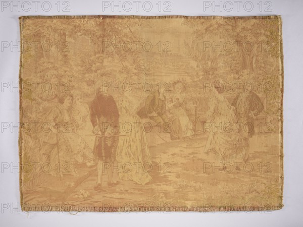 Jacquard tapestry by Alonso Pérez Mariano 1857–1930, co-creator unknown, woven by a manufacturer., noted. Fabrics for interior decoration, decorative fabric/inner furnishing. Genre scene: ladies and gentlemen in Louis XVI–era costume watching a lady jumping rope, set in a park landscape. No border. Monochromatic colors in shades of beige and ochre. 19th–20th century, Europe. Height 73 cm, width 101 cm., A woven textile panel shows a pastoral scene with a group of people in period clothing arranged across a landscape. The fabric has a dominant warm golden-beige tone with variations in ochre and muted tan creating the figures and background through woven shading. On the left, a group of women sit and stand near foliage, while a man in darker clothing stands nearby holding an object; toward the center, seated figures appear to be engaged with each other, and on the right two standing figures face one another. The background includes trees and leafy vegetation woven in slightly darker and ...