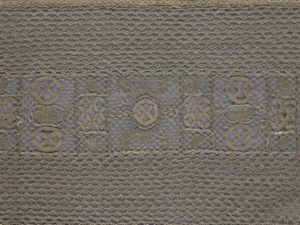 A so-called Saxon lace belt, lace belt/men's clothing accessory. The central part is a continuous belt with a geometric ornament; among the motifs is a circle containing an hourglass. Side belts of similar width are permanently connected. The entire belt is trimmed with fringe. 17th/18th century, Poland. Materials: lace. Dimensions: height 270 cm, width 25 cm., A close-up of a textured fabric with an open, net-like weave in beige and gray tones, featuring a central horizontal band with a decorative pattern of embroidered geometric motifs and oval shapes; the surrounding areas show a repeating diamond mesh with braided threads, and the overall palette includes shades of beige, tan, light brown, and muted gray.