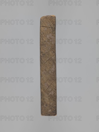 Double-sided gingerbread mould. Rectangular shape; obverse: man in 18th-century attire tricorn hat, justokor, culottes, long boots seated on a goat, carved inscription at the bottom: EIN SCHÖNER BOCK EIN GUTER / PFERD IST EINER GN ... DIE ZIGE WERT, with plant and floral ornament beneath; reverse: Adam and Eve in Paradise wearing leaf loincloths before the Tree of Knowledge with a coiled serpent; above them a bearded figure holding an orb probable God with sun, moon and stars in the heavenly vault; animals around Adam and Eve cat, deer, bird, cow, squirrel; composition within a round decorative frame with a plant twig motif. Gingerbread mould, wood. 18th–19th century, Silesia 1742–1918. Height 21.4 cm; width 24 cm; depth 3.7 cm. Subjects and motifs: animals, riders, folk-style decorations, Adam and Eve, plant and floral motifs, historical costumes, original sin, pomegranates, snake, religious motifs, decorative art, customs., A vertically oriented rectangular wooden object with worn, r...