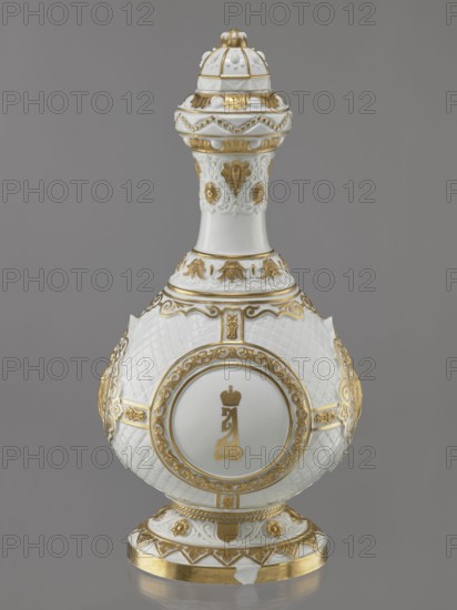 Bottle-shaped vase with a domed lid. Imperial Porcelain Factory in St. Petersburg 1744–1917; modeler: August Karlowicz Spiess 1817–1904. Embossed and colorfully painted decoration with four medallions set against a rococo latticework: a miniature portrait of Tsar Alexander II in ceremonial military uniform with epaulettes and a blue ribbon, the Tsar's monogram, and the Tsar's double-headed eagle. Gilded floral and plant elements. Condition: gap at the base, worn gilding. 1869, St. Petersburg, Russia. Porcelain vessel; height 49.5 cm, width 22 cm., A decorative porcelain vessel with a rounded body, tall neck, and domed lid, shown against a gray background; the object is primarily white with extensive gold ornamentation including raised gold accents, gilded borders, and gilded sculptural motifs; the body has a textured, quilted-like surface and a few circular framed panels bordered in gold; the neck and lid feature embossed floral and foliate decorations in white highlighted with gold, a...