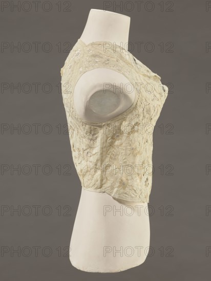 Bodice, lace, provenance unknown, bodices, women's clothing, fashion. In a pattern of rosettes connected by large spiders and heads; pattern of stylized floral motifs. 19th century, France. Clothing accessory. Height 36 cm, circumference 63 cm., A mannequin torso displayed in profile wearing a sleeveless lace bodice in a pale cream color, showing an intricate floral lace pattern with openwork and scalloped edges; the mannequin is an off-white plaster tone with a round shoulder form where the arm would be, and the background is a uniform muted gray-brown.