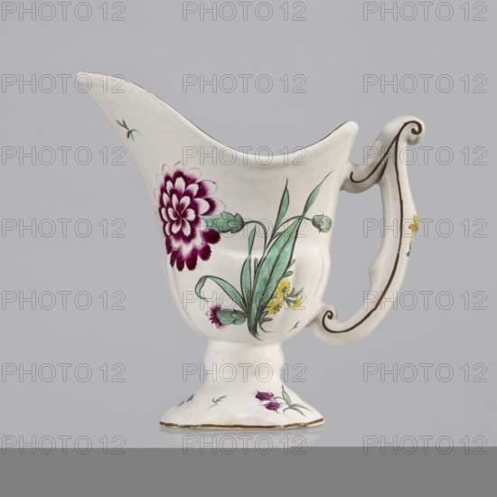 Nalewka, Prószków Slaski faience factory; 1763–1853, maker/manufacturer inscriptions; floral decorations; locking; carnations; repossession noted; helmet-shaped nalewka with locking and fluted surface. Bowl base and vaulted foot modeled with four leaves. T-shaped handle. Colorful decoration: bouquet with a large purple carnation with three buds and three small yellow flowers; small projections of flowers and leaves. Brown borders along the handle, edge of the bowl, and foot. Dated 1770–1783. Region: Silesia, Province of Silesia. Prószków Slaski. Vessel. Height 19.0 cm; width 19.0 cm; depth 9.5 cm., A white ceramic pitcher with a curved spout and ornate handle decorated with hand-painted floral motifs, showing a large magenta flower with layered petals, green leaves and stems, smaller yellow and purple blossoms, and small green accents; the handle has a brown outline and a small yellow flower detail, and the footed base is white with painted floral touches and a thin brown rim.