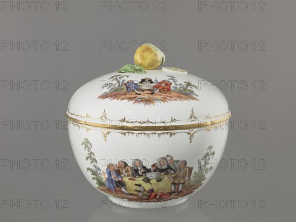 Punch Vase with Lid, Königliche Porzellan-Manufaktur KPM, Berlin; 1763–1918, porcelain, reliefs, polychrome miniatures. Hemispherical bowl with a bottom rim and an arched circular lid topped by a modeled half peeled lemon with stem, leaf, two slices and rolled peel. Rim of vase and lid with gilded relief rocaille decoration. Two color miniatures on the lid park scenes: 1 three men in 18th-century costume seated at a table with a vase and glasses; 2 three men at a table with a vase, one standing. Two color miniatures on the bowl park settings: 1 six people seated at a round table with glasses and pipes, one reclining before the table; 2 seven people seated at a table, singing, smoking pipes and conversing. 4th quarter of the 18th century, Berlin, Germany. Vase; height 27.5 cm, width 28 cm., A rounded white porcelain jar with a domed lid sits against a gray background; the lid is topped with a sculpted yellow fruit and a green leaf. The jar and lid feature painted scenes of people in per...
