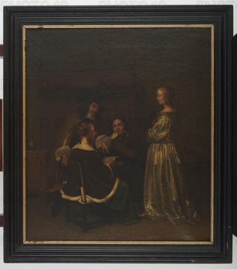 Reading a letter, Borch, Gerard ter, II 1617-1681 painter workshop, interiors, genre scenes, Dutch painting, genre painting, 17th century, painting, height 72 cm, width 64 cm, A framed painting showing a dimly lit interior scene with a group of people gathered; a woman stands to the right wearing a long shiny gown in shades of gold and cream, her hair pulled back and a small dark detail near her head, while three seated or leaning figures to the left wear dark clothing with touches of white and warm brown, one figure wearing a dark hat and another with a fur-trimmed dark coat seated in a chair with a dark frame and light trim. The background and room are rendered in deep brown and muted black tones, and there is a small rounded jug or vessel on a surface to the left in earthy brown. The painting is surrounded by a wide dark frame with black and gold accents.