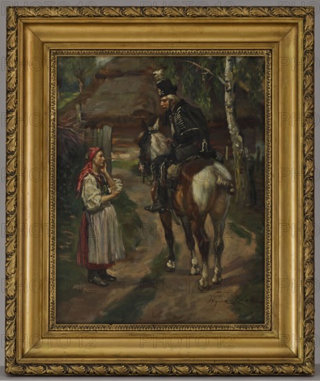 Sad news, Kossak, Wojciech 1856–1942, painter; 1910; painting; height 57 cm, width 44.5 cm, A framed oil painting shows a rural scene with a woman standing on a dirt path facing a mounted man; the woman wears a white blouse, a red headscarf, and a skirt with red and white tones, and she holds something small in her hands while looking up; the man sits on a brown and white horse and wears a dark uniform with decorative trim and a tall dark hat; behind them are trees with green foliage and a thatched-roof structure in muted brown and gray tones; the ground and surrounding area show earthy browns and greens, and the overall palette includes shades of brown, green, red, white, black, and gray; the painting is set in an ornate gold frame with carved detailing.