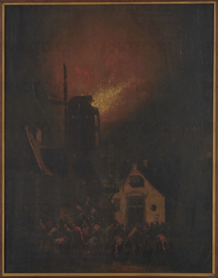 Windmill Fire, Poel, Adriaen Lievensz. van der 1628-1671/1691 painter, scenes against the sky, genre scenes, Dutch painting, fires, windmills, 17th century, painting, height 47 cm, width 36.5 cm, A dark painting framed in brown and gold tones shows a night scene with a glowing warm light near the top center that casts orange and yellow highlights into a surrounding reddish-brown sky, fading into deep black and dark brown areas. In the lower portion, a group of people wearing muted clothing in shades of brown, gray, dark green, and touches of red are gathered and bent over, forming a crowded scene in front of a few buildings. One building on the right has a pale beige facade and a darker roof, while a larger dark structure with vertical elements and a blade-like silhouette rises behind and to the left of it, partially illuminated by the warm glow. The overall palette is dominated by black, dark brown, reddish-brown, beige, yellow, and small accents of red and gray.