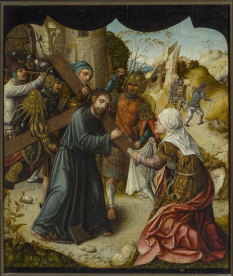 Christ Carrying the Cross and St. Veronica, unknown Netherlandish painter, painting, Netherlandish religious painting depicting Veronica St. and the New Testament scene of Christ Carrying the Cross Gospel, 1st quarter of the 16th century; painting: height 62 cm, width 53 cm; with frame: height 74 cm, width 65 cm, thickness 7.5 cm., A scene shows a man in a dark gray robe bearing a large wooden cross, his head bowed and wearing a crown of thorns, surrounded by armored figures in ornate helmets and armor with gold, red, green, and black details; a kneeling woman in a patterned dress with white head covering and a red skirt reaches toward him holding a white cloth; behind them a warrior in red and gold armor gestures while other soldiers in muted colors and helmets press forward near a stone building; the landscape beyond features pale blue sky, rocky beige hills, and sparse green trees and shrubs, while the foreground includes earthy browns, green plants, and scattered pale stones.