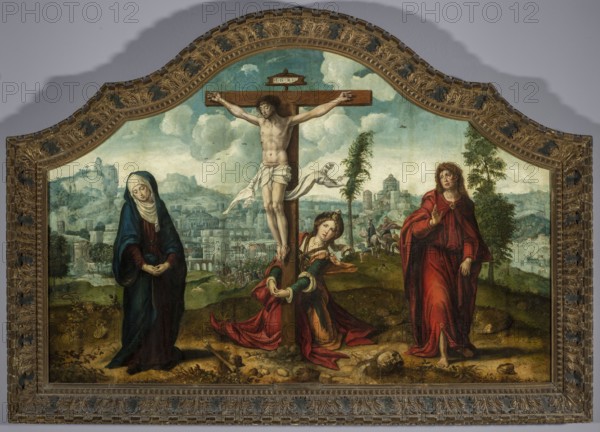 Crucifixion, Coecke van Aelst, Pieter 1502-1550 and workshop, Netherlandish painting; subject: Mary mother of Jesus, Mary Magdalene, John the Evangelist, Jesus Christ; iconography: Crucifixion, New Testament biblical scenes; setting: Jerusalem, cityscapes and landscapes; date: 1530–1533; medium: painting; dimensions: height 92 cm, width 138 cm; with frame: height 113 cm, width 160 cm; thickness 7.5 cm., A painted scene framed in an ornate carved frame shows a central wooden cross with a pale, nearly nude figure suspended from it, draped with a white cloth; at the foot of the cross a woman kneels wearing a dress with green and red fabrics and gold accents, clutching the base of the cross. To the left a standing woman in dark blue and deep green robes with a pale head covering looks downward with hands clasped, and to the right a standing figure in a flowing red robe gestures with one hand while the other hangs by the side. The background displays a distant hilly townscape with stone bui...