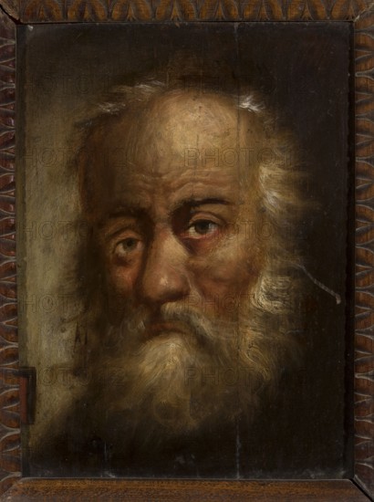 Head of St. Thomas the Apostle. The head of an old man with sparse grey hair above a vaulted forehead is turned slightly to the left. Irregularly placed eyes with a tired expression stare into the indefinite distance; disheveled sideburns surround the face, and deep furrows on the forehead. The background on the left side of the head is light, on the right dark. The painting is executed with thick, quick brushstrokes. On the lower left, a builder's square partially cut off by the edge — an attribute of St. Thomas. 18th/19th century painting, height 27.5 cm, width 21.5 cm., A painted close-up of an elderly man's face framed by a carved wooden border, showing a wrinkled forehead, bushy white eyebrows, tired eyes, a large nose, and a long white beard and mustache with flowing, textured brushstrokes; the palette includes browns, ochres, beige, cream, muted reds, and dark shadows in black and deep brown, with subtle highlights of pale yellow and gray in the hair and beard.