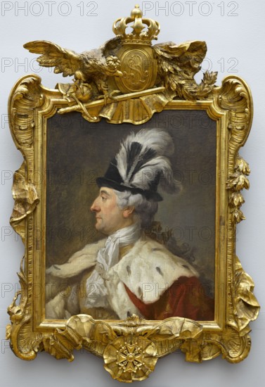 Portrait of King Stanislaw August in a feathered hat, Marcello Bacciarelli 1731–1818, ca. 1780. Oil painting, 71 × 57 cm. The king shown in bust, left profile, wearing a black hat with ostrich feathers and a scarlet cloak with a large ermine collar; thick locks of ash-coloured hair above the ears and a similar ponytail down the back. Plain neutral gray-beige background. Neo-Rococo carved and gilded frame made in the workshop of Antoni Strzalecki: upper part with a medallion bearing the monarch’s initials supported by an eagle and topped with a crown; lower part with a carved representation of the Order of St. Stanislaw established 1765., Stanislaw August Poniatowski; Order of St. Stanislaus; ermine; feathers; profile portrait; male portrait; grey-haired., A framed oil portrait of a man shown in profile wearing a dark hat adorned with large white and gray feathers, a white powdered wig, and a white fur-trimmed cloak over a red garment; the man has a pale complexion and a neutral express...