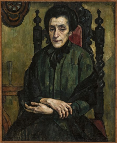 Portrait of Natalia Aszer Ascher, Roman Kramsztyk 1885–1942, painter. Contemporary painting, women's portrait, interwar period, ca. 1922, Poland. Oil on canvas, height 85 cm, width 68.5 cm. Association of Polish Artists Rytm Warsaw; 1922–1932 noted., mentioned., A seated person with pale skin and short dark hair wears a dark green garment and a black shawl while resting hands folded in their lap; they sit on a tall carved wooden chair with a red upholstered back, set against a muted olive-green wall with a wooden decorative element and a small table holding a tall glass to one side; dominant colors are dark green, black, olive, brown, red, and pale skin tones.