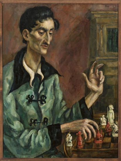 Chess Player Portrait of Bruno Winawer, Roman Kramsztyk 1885–1942, contemporary painting, male portrait, interwar period, ca. 1918, Poland; subject: chess player; painting; dimensions: height 90 cm, width 68 cm., A seated person with dark hair and a pale complexion wears a loose greenish-blue garment with dark trim and a white collar, their elongated face turned slightly to the side with a contemplative expression; their hands are prominent, one raised with fingers curved and the other reaching toward a wooden board with carved game pieces in shades of red and off-white, set against a warm brown and reddish mottled background with a tall wooden cabinet visible to the right.