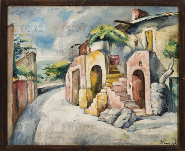 Catalan Landscape A Street in Collioure, Kramsztyk, Roman 1885–1942 painter, contemporary painting, interwar period, Spain, landscapes, ca. 1925, Spain place of creation, painting, height 60 cm, width 74 cm, A painted scene of a village street with buildings and trees, shown in a wooden frame. The composition includes a curving pale road or path in the foreground leading past a group of arched doorways and stepped entrances carved into warm-toned structures. The buildings display colors such as pink, yellow, beige, and off-white, with areas of darker brown and ochre on steps and doorways. There is green foliage and a tree with green leaves positioned above and beside the buildings, and a twisted pale trunk of another tree to the right. The sky is painted with shades of blue, gray, and white, and distant greenery in muted green and yellow sits along the horizon. Rocks or rounded stones in gray and bluish tones lie near the base of the steps, and there are shadowed areas in deep gray and...