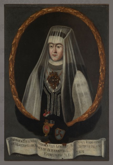 Portrait of Barbara Radziwill née Koly Wolska ?-1550, mother of Barbara Radziwill, unknown Polish painter. Oval portrait in a laurel wreath incorporated into the painting's rectangle. Within the oval: half-length, turned slightly to the left, a woman in a white bonnet with a flowing white veil, in a sleeveless black dress and a white shirt with a ruff. On the bodice is a huge multi-leaf pendant decorated with stones and pearls, and four double strings of pearls. The face is elongated with prominent eyebrows and a long nose. The background of the portrait is brown and smooth. The portrait rests on the back of a black eagle with spread wings, with a princely mitre on its head and the Traby coat of arms on its chest. In its beak it holds the Junosza coat of arms, and in its talons a white ribbon with a Latin inscription. The background of the composition is gray-blue and smooth. At the bottom left, an inscription in white paint: N 100, partially washed out. 1733–1737; oil painting; 108 × ...