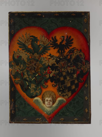 Portrait of Gotard Kettler, first Duke of Courland and Semigallia 1518/1571–1587, unknown author painter, architecture, angels, three-quarter portrait, coats of arms, copy, man in costume, interior, seated figure, foreign miniature, dated 1590–1616, miniature, height 13.8 cm, width 10.1 cm, A painted rectangular panel with a large heart-shaped central motif in shades of red and orange set against a dark green patterned background, framed by a black border with small gold decorative elements; within the heart are two stylized birds with spread wings rendered in dark green and black, ornate scrolling foliage and shield-like heraldic shapes in muted greens, browns, gold, and black, and a small cherubic face with pale skin and blond hair surrounded by pale green wings and a gold halo near the bottom of the heart.