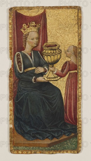 Tarocca playing card — Queen of Cups illuminated, unknown painter, Italian painting, costumes, women, foreign miniatures, symbols, parlour games, restitution provenance, dated 1450–1500, Italy Florence, varia; dimensions: 17.0 × 8.4 cm; frame or mount: 31.5 × 38 × 1.5 cm., A seated figure wearing a golden crown and a dark blue dress with decorative sleeve openings is positioned on a platform against a background with a deep red drapery and a gold patterned panel; the crowned figure holds a large ornate golden goblet that is being offered by a standing figure in a long red robe with a pale face and short hair. The scene includes a gilded border with worn decorative motifs, the seated figure has pale skin and light brown curled hair, the standing figure has pale skin and light brown hair, and visible colors include gold, deep red, dark blue, green, brown, and pale skin tones.