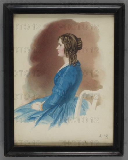 Archduchess Hildegard Ludwig of Bavaria 1825–1864, daughter of Ludwig I of Bavaria and Theresa of Saxe-Hildburghausen, wife of Archduke Albert Frederick of Habsburg; painted by Ernst Wilhelm Rietschel 1824–1860 painter. Subject: ruler/aristocracy, seated figure in profile; dress and hairstyle characteristic of 1840 crinolines. Miniature, height 26.1 cm, width 20.1 cm. Keywords: portrait, miniature, kings, Austria, Munich., A framed painted portrait of a seated woman in profile wearing a blue dress with ruffled sleeves, her hands folded in her lap and a bracelet visible on one wrist; she has brown curly hair styled into ringlets and a braided bun, a pale complexion with pink cheeks, and a neutral expression while seated on a light-colored chair against a softly blended brown and beige background.