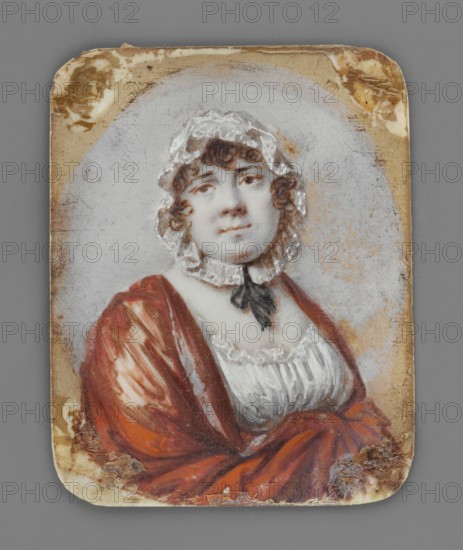 Princess Maria Adamovna Golitsyna 1757–1820, daughter of Adam Vasilievich Olsufiev d. 1784 and Anna Vasilievna Saltykov, wife of Prince Nikolai Alexeyevich Golitsyna. Painted by Alexander Molinari 1772–1831. Portrait bust 3/4 left, head straight; miniature height 5.7 cm, width 4.5 cm, 1800–1820, St. Petersburg. Depicts woman in a white bonnet trimmed with a ruffle and tied under the chin with a black ribbon, white dress, rusty shawl on the shoulders; background dirty blue. Style: Empire. No frame., A painted portrait of a woman shown from the waist up, wearing a white lace cap with ruffled edges and a black ribbon tied at her throat, with short curly brown hair peeking out; she has a light skin tone and a neutral expression. She is dressed in a white bodice with ruffled trim beneath a draped red cloak or shawl with highlights and folds. The painted figure sits against a pale, roughly oval background surrounded by a worn, aged rectangular border with visible scuffs and areas of brownish...